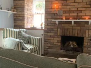 Image of One bedroom, indoor fireplace. Right beside beach.