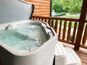 Image of Romantic Waterview Lodge Suite w\/ Hot Tub