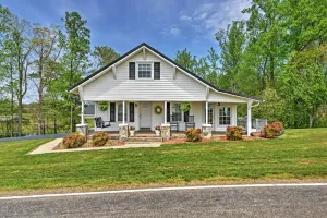 Image of Dobson Farmhouse with Wraparound Porch and Fire Pit!