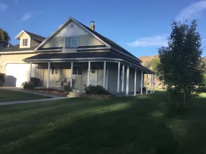Image of Mountain Valley Getaway. Cozy farmhouse near a beautiful lake in northern Utah.