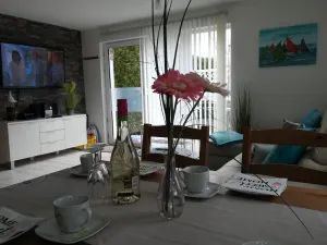 Image of 4 * FH with garden, playground, sauna, fitness, 2 bedrooms, kitchen with dishwasher