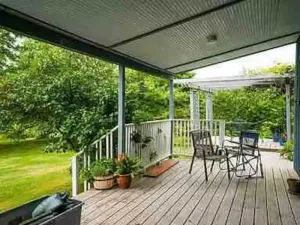 Image of Hill top home located on 30 acres with privacy and surrounding natural beauty.