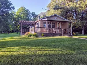 Image of Trees, wildlife abound- a beautiful surrounding as you relax in a cozy cabin