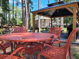 Image of Water access tiny cabin, kayaks, dock, fire pit, gazebo, grill, fishing, boating