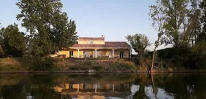 Image of Contemporary house with heated swimming pool on the edge of a private lake... paradise