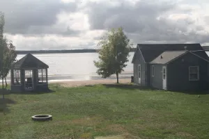 Image of The beach is calling...right outside your window... come relax and play!