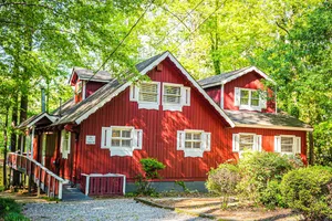 Image of One of a kind our Mini Lodge Chalet directly across from our pool!