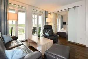 Image of Vacation apartment close to the beach with sauna and great, covered balcony with dyke view - Resort Deichgraf