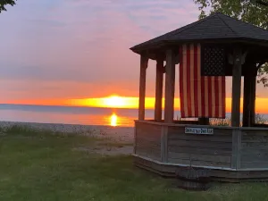 Image of At Lake Huron Shore Sunrise View entire family Home with Beach