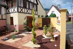 Image of Typical Alsatian house in the heart of the vineyards and at the foot of the mountains