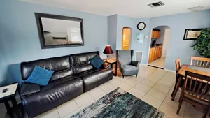 Image of \"UNDER THE PALMS\" of Downtown Mount Dora