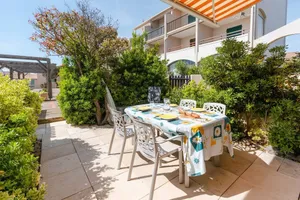 Image of Duplex à Saint-Pierre-La-Mer - Parking, 2 Chambres, Terrasse - FR-1-409A-24
