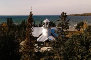 Image of Bois Blanc Island Lighthouse Home. Iconic Sunset Views of the Mackinac Bridge!