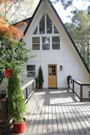 Image of A frame cottage with private dock on lake