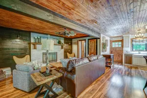 Image of Gorgeous modern cabin with covered patio, firepit, full kitchen, & central AC
