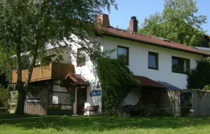 Image of RHÖN-ANTIK\" apartment with wood-burning stove and terrace for barbecuing.