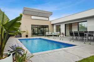 Image of Poolside Haven: Relax by the Beach