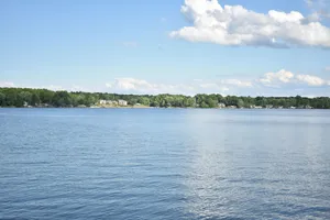 Image of Lakeside living awaits at beautiful Lake Milton, OH\n with dock across the street
