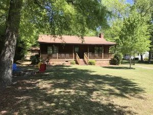 Image of Beautiful Log Cabin with Private Dock and Boat Ramp