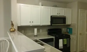 Image of Lovely Renovated 4 Bedroom home with easy highway access and optional Gym Access