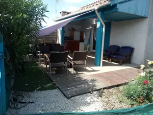 Image of house in swimming pool and tennis court