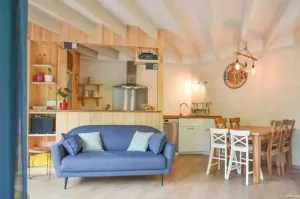 Image of Le colibri, wooden house near river and forest