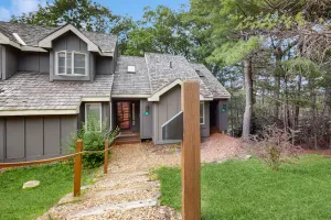 Image of Treetop condo near golf + skiing with deck, grill, fireplace, & washer\/dryer