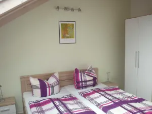 Image of Semi-detached house Drossel - Semi-detached holiday home by the lake & forest