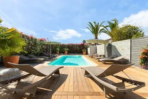 Image of 3 minutes walk to the beach of cala rossa 4 villas standing pool area