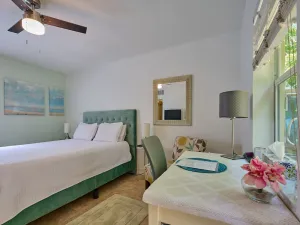 Image of Steps to the beach! Secluded,!  2 min walk to beach! Private fenced patio!