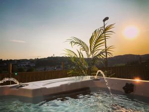 Image of Spa house with private Jacuzzi and whirlpool bath overlooking the countryside