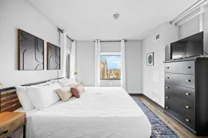 Image of King Bed | Onsite Gym | Downtown Views | Parking