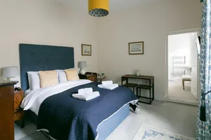 Image of Luxury King bedroom with ensuite bathroom in a wing of a private Country House
