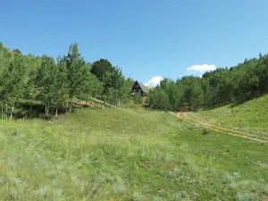 Image of Imagine a romantic couple’s cabin nestled in the heart of the Colorado Rockies