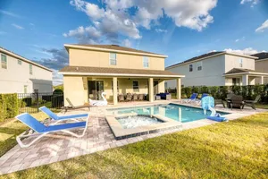 Image of 9 Bed/9Bath/LARGE POOL AND HOT TUB/only 10 mins Disney/Stylish and Contemporary