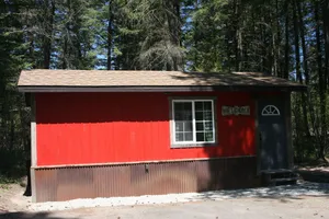 Image of Tiny Red Farmhouse centrally located in Columbia Falls
