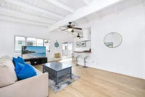 Image of 2 Bedroom Upstairs with Balcony Steps from the Sand