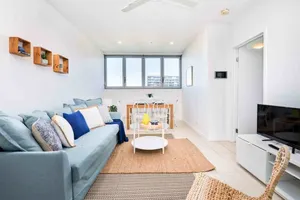 Image of Bright & Spacious Apt with Pool, Parking & Wi-Fi