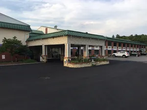 Image of Super 6 Inn and Suites