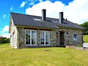 Image of Detached natural stone house with sunny garden and terrace, modern interior