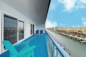 Image of Canal-front W/ Pools & Walkable Locale 2 Bedroom Condo
