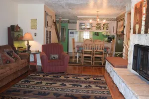 Image of Claim Jumper Townhouse 02 - On the River - Across from the Fishing Ponds - WiFi - Cable - Near Ski Area - Wood Burning Fireplace