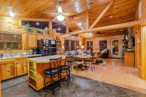 Image of Crooked Pine Cabin With Swing and Hot Tub on the Deck by Redawning
