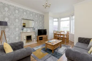 Image of 414 Spacious 1 bedroom ground floor apartment near Leith with sofa bed in living room