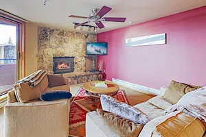 Image of Lakefront Condo with Mountain Views & Shared Hot Tub - Walk to Town & Ski Access