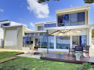 Image of 'whispering Sands' 10 Sandy Point Road Luxury Waterfront Home With Aircon Wifi & Foxtel