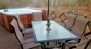 Image of Cast Away Family Cabin with Hot Tub, Fireplace, and Kids Area by RedAwning