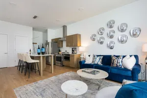 Image of Illume Sleek Central Hideaway Poolside Patio 1 Bedroom Condo