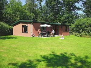 Image of Nicely Furnished Bungalow With a Fireplace and Green Area