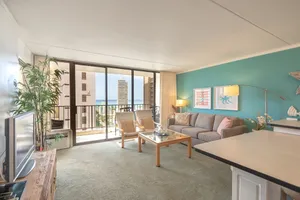 Image of Modern 12th Floor Waikiki Banyan Condo With Partial Ocean Views by Redawning